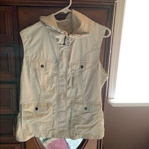 Sleeveless vest with lots of pockets.